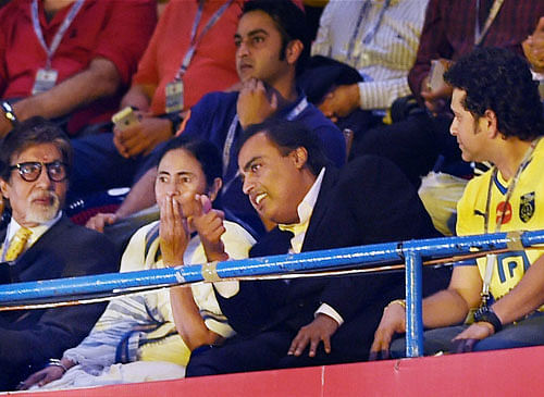 West Bengal Chief Minister Mamata Banerjee with Industrialist Mukesh Ambani, actor Amitabh Bachchan and cricketer Sachin Tendulkar during the opening of Indian Super League 2014 in Kolkata on Sunday. PTI Photo