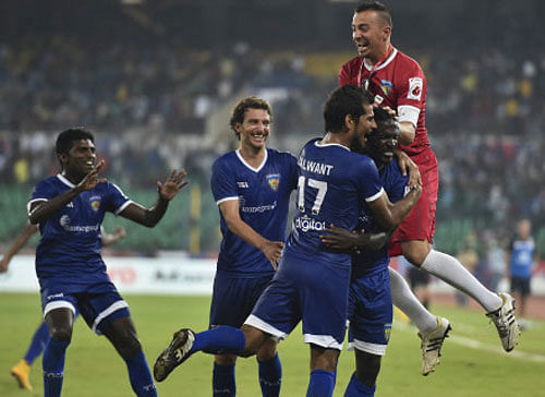 Chennaiyin FC player Bernard Mendy along with teammates celebrating after scoring a goal against Kerala Blasters FC during the Indian Super League 2014 in Chennai on Tuesday. PTI Photo