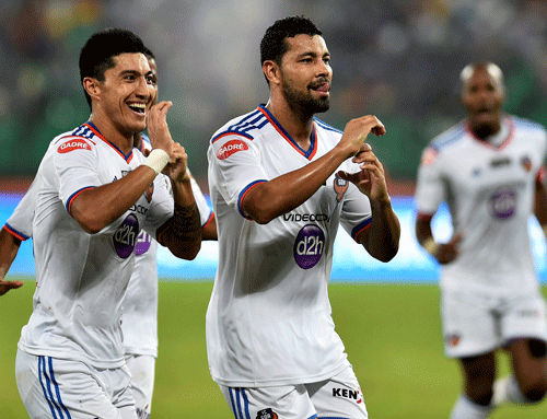 Goa FC players celebrating after score a goal against Chennaiyin FC during the ISL match in Chennai on Friday. PTI Photo