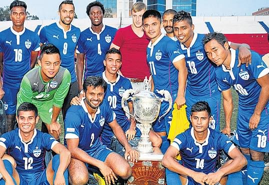 joyous The victorious BFC team with Puttaiah Memorial title after beating ASC in the final at the Bangalore Football Stadium on Saturday&#8200;. dh photo