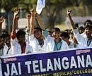 Medical students from the Telangana region shout slogans during a meeting at Osmania Medical College in Hyderabad. File Photo/AFP
