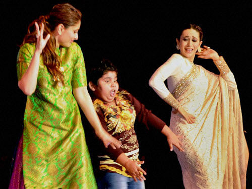 Bollywood Actresses Karishma Kapoor and Kareena Kapoor perform at the inaugural function of 19th International Children's Film Festival of India in Hyderabad. A short film made Karisma Kapoor's daughter was screened at the Film Festival. PTI photo