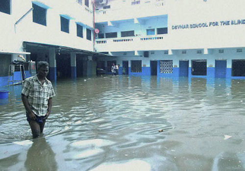 A view of a flooded School at Begumpet after heavy rains in Hyderabad on Wednesday. PTI