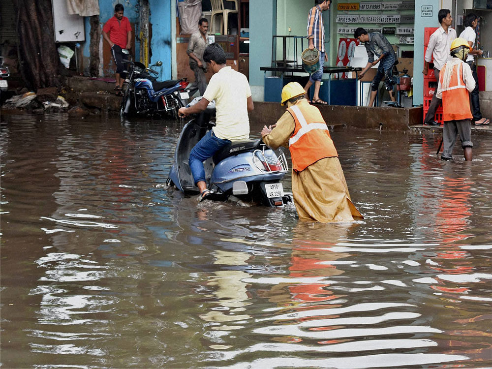 Heavy rains battered the city which is a major center for the technology industry, and some other parts of Telangana for the past couple of days, throwing life out of gear in some places. PTI photo