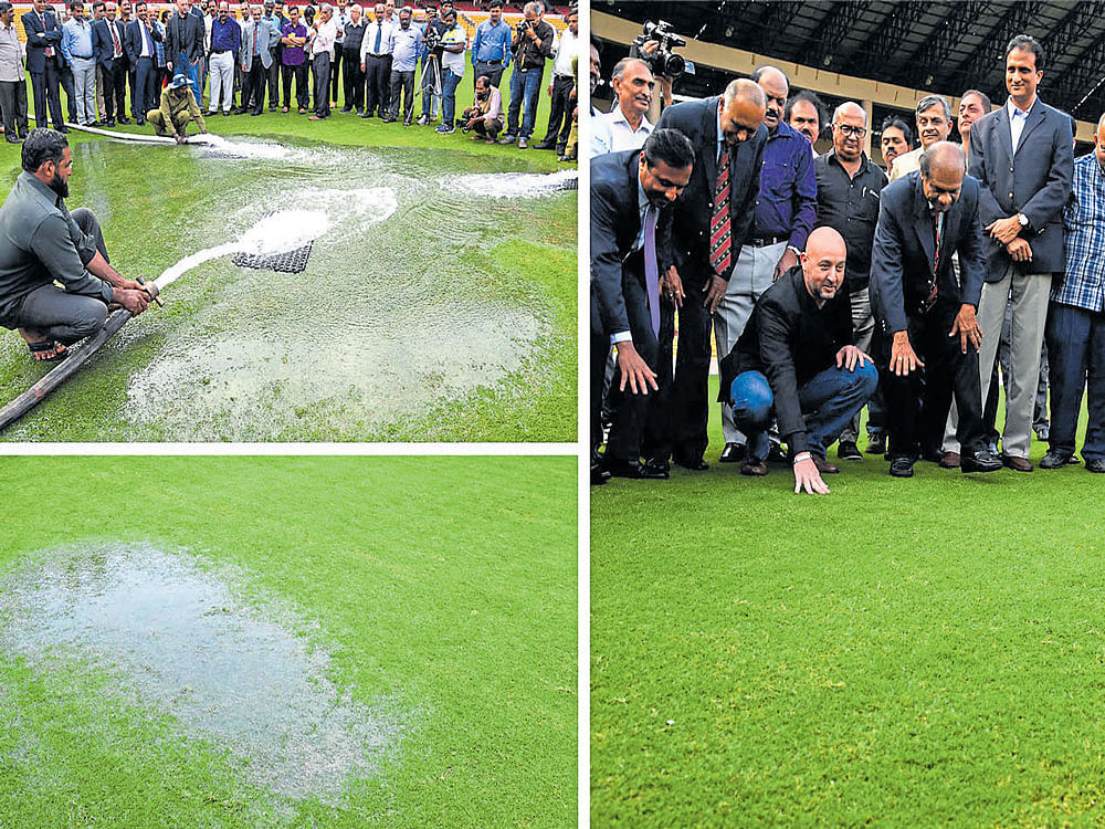 STATE-OF-THE-ART FACILITY KSCA ground staff demonstrate the way the subsurface aeration and vaccum-powered drainage system installed at the Chinnaswamy Stadium functions onWednesday. The systemfacilitates the rapid drying of the ground, minimising delays and cancellations due to wet outfield. DH PHOTOS