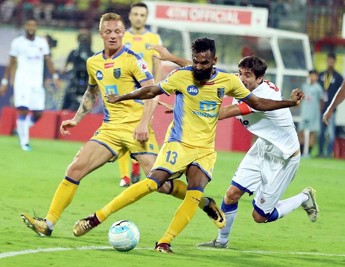 Kerala Blasters' CK Vineeth (centre) in action during their Indian Super League clash against Chennaiyin FC on Friday. PTI