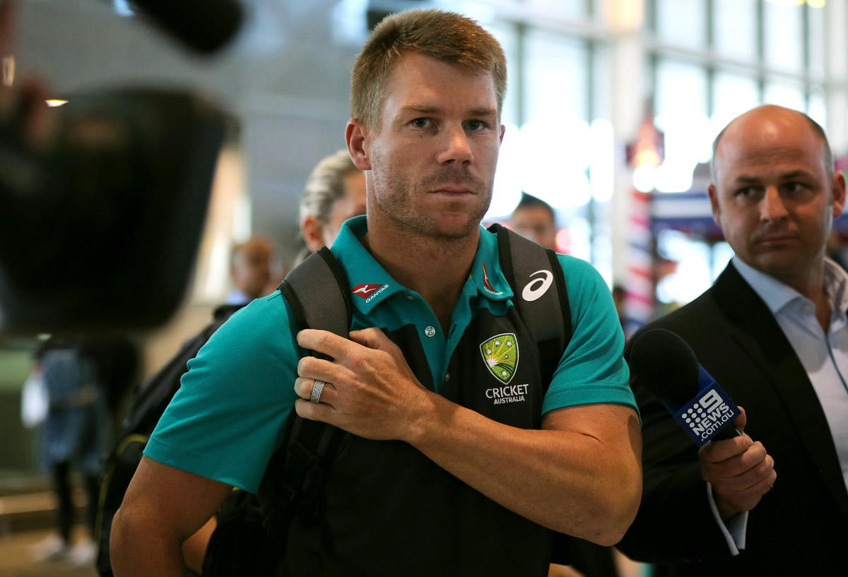 Australian cricketer David Warner arrives at Cape Town International Airport, South Africa. Reuters Photo
