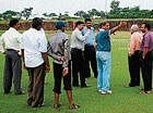 Karnataka Cricket Board Assistant Secretary Sudhakar Rao and others inspecting the pitch at Manipal University turf maidan on Saturday. DH photo