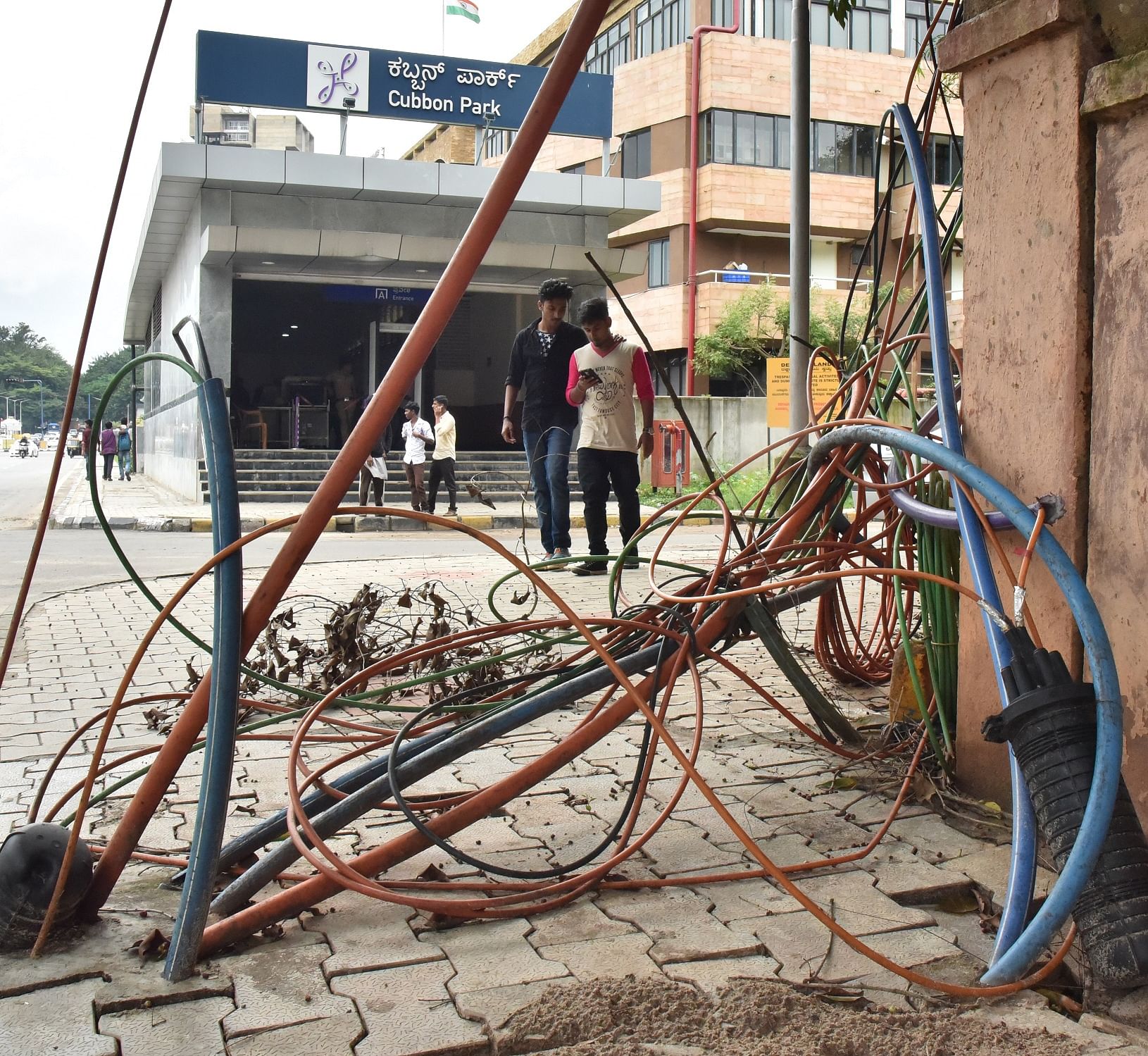 Optical fiber cables laid on pedestrian paths at Cubbon road in Bengaluru. DH Photo/Janardhan B K