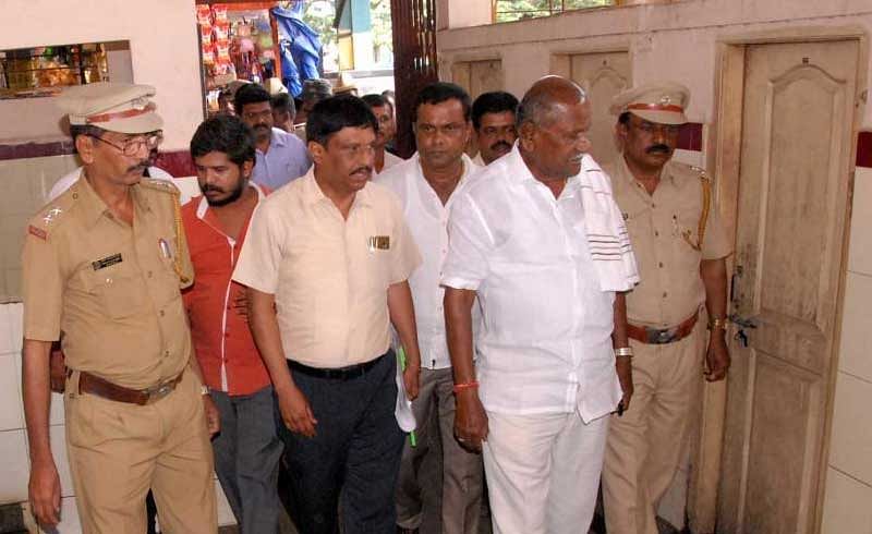 Transport Minister D C Tammanna inspect toilets in KSRTC bus stand at Chikkamagaluru on Sunday.