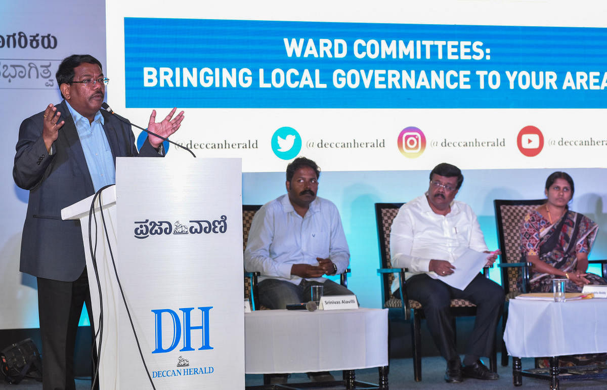 Manjunath Prasad, BBMP Commissioner, speaking in 'Ward committees, Bringing Democracy to your Doorstep', conversation organised by Deccan Herald and Citizens for Civic amenities at The Chancery Pavilion in Bengaluru on Saturday. (DH Photo)