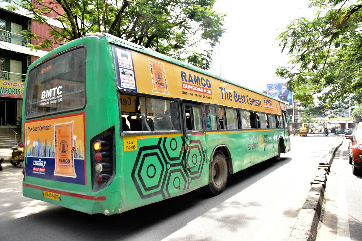 Advertisements on BMTC buses, like the ones in the picture, will be removed by the corporation. DH Photo/Janardhan B K