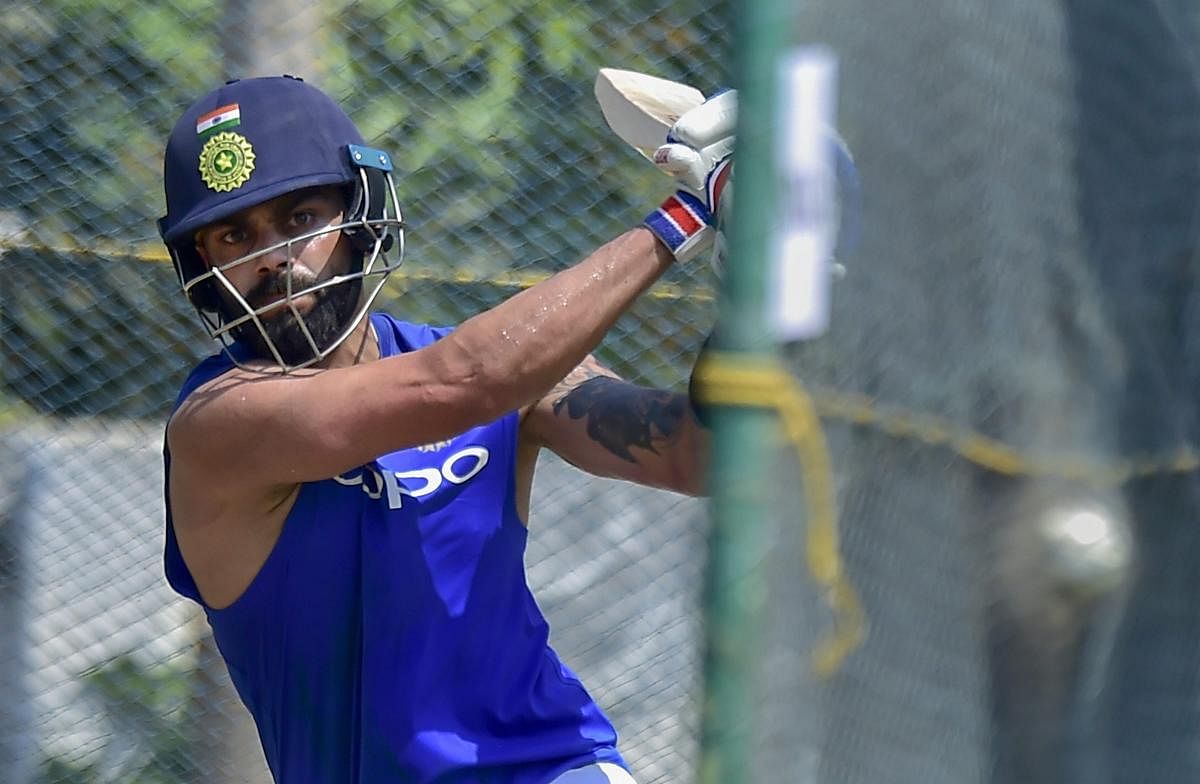 Indian captain Virat Kohli during a training session on the eve of the first T20I against Australia in Visakhapatnam. PTI