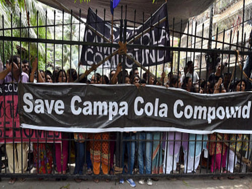 As the face-off over eviction of Campa Cola society residents stretched into the third day, the residents petitioned President Pranab Mukherjee seeking his intervention to stay the demolition of the illegal flats. PTI photo