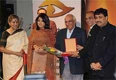 Union Minister of Information & Broadcasting Ambika Soni (L) alongwith actress Tanushri Datta, Yash Chopra and Chief Minister of Maharastra Ashok Chavan during the inauguration of the 11th Mumbai International Film Festival at NCPA, in Mumbai on Wednesday. PTI