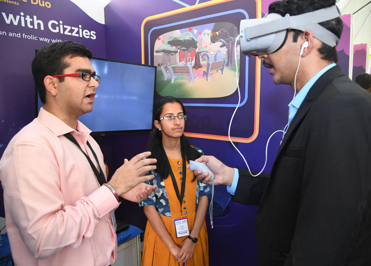 Jivesh Piplani and Kriti Goel, from Meerut’s Institute of Engineering and Technology, demonstrate prototypes designed by them using virtual reality in Bengaluru on Saturday. DH PHOTO/SRIKANTA SHARMA R
