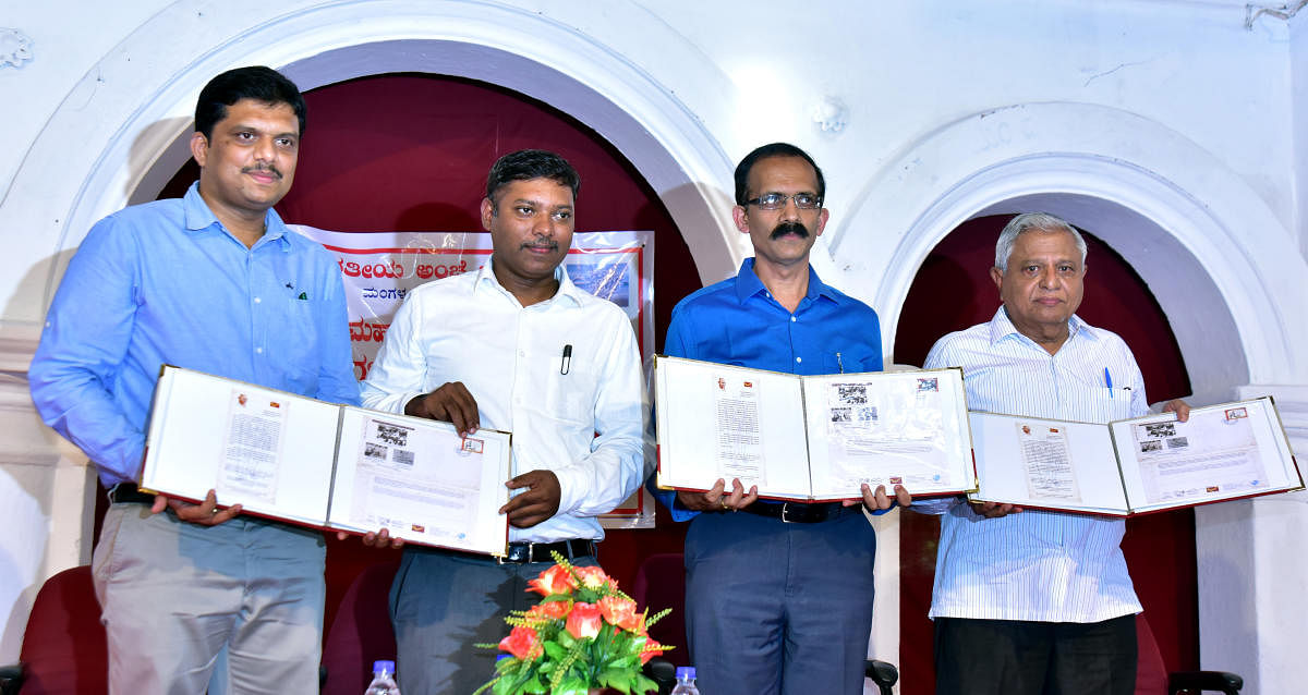 Dakshina Kannada Deputy Commissioner Sasikanth Senthil (2nd from left) releases on Saturday a special cover on the theme ‘prohibition’, at Jnanodaya Samaj Mandir at Hoige Bazar, Mangaluru, where Gandhiji had addressed a gathering 85 years ago. Mohanappa Thingalaya’s grandson and president of the Mandir Premachandra K Thingalaya (right) is seen.