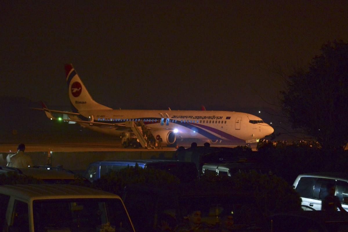 The hijacked Dubai-bound Bangladesh Biman plane is seen at the tarmac after an emergency landing at the Shah Amanat International Airport in Chittagong on February 24, 2019. AFP photo