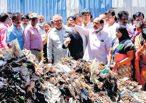 Study tour: BBMP team led by Mayor B S Satyanarayana at a garbage treatment plant at Salem in Tamil Nadu. Miniser Ramalinga Reddy and MLA Munirathna are also with him.