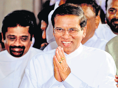 Sri Lanka today took the first step towards handing back military-occupied land in the country's war-ravaged north with President Maithripala Sirisena returning 425 acres to its original Tamil owners.
