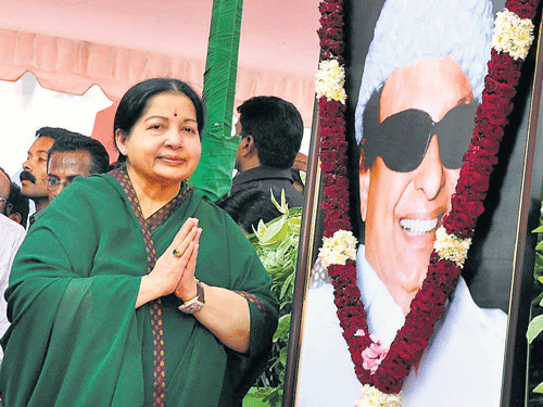 Jayalalitha offers floral tributes to AIADMK founder MGR. PTI