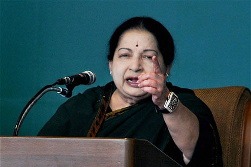 Tamil Nadu Chief Minister and AIADMK supremo J Jayalalithaa addresses the gathering at an election campaign rally. PTI File Photo