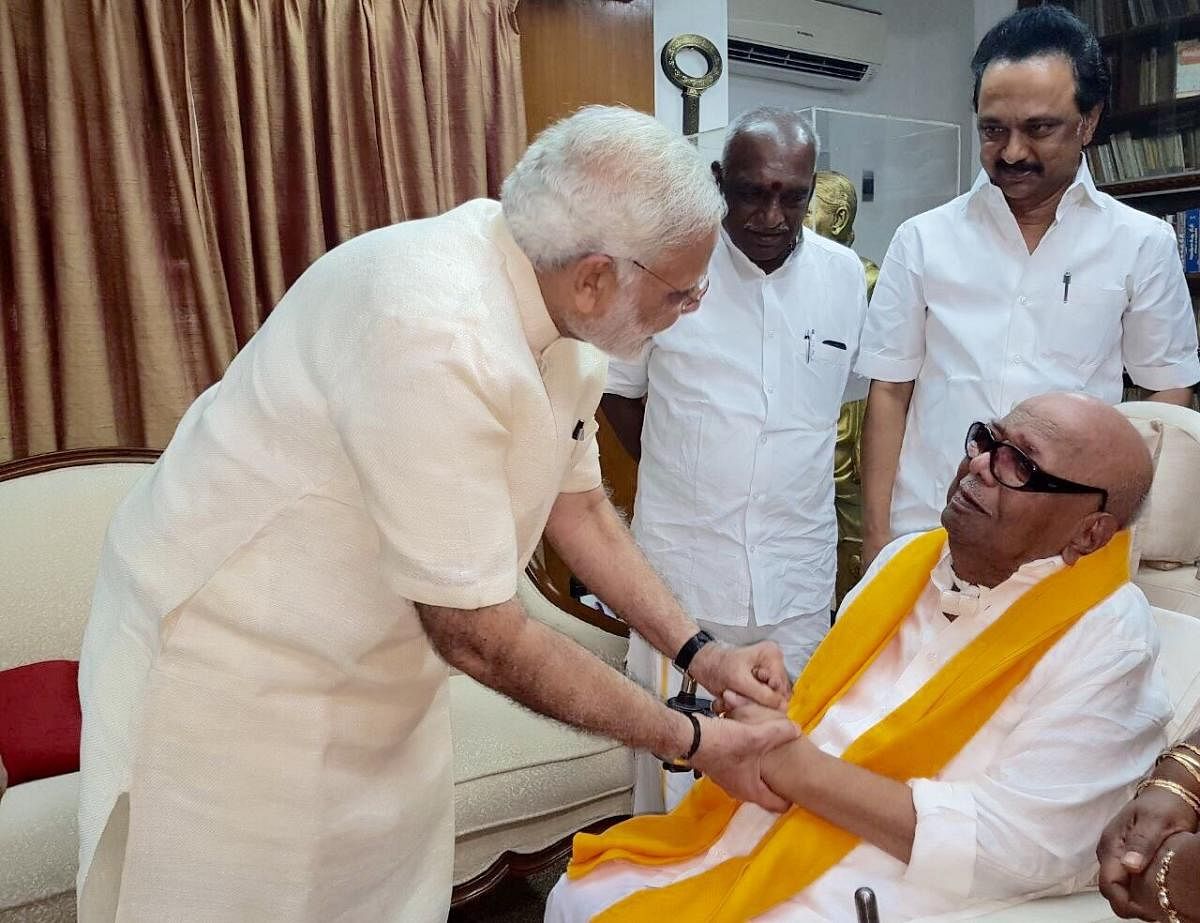 Prime Minister Narendra Modi met DMK president M Karunanidhi and enquired about his health on Monday.