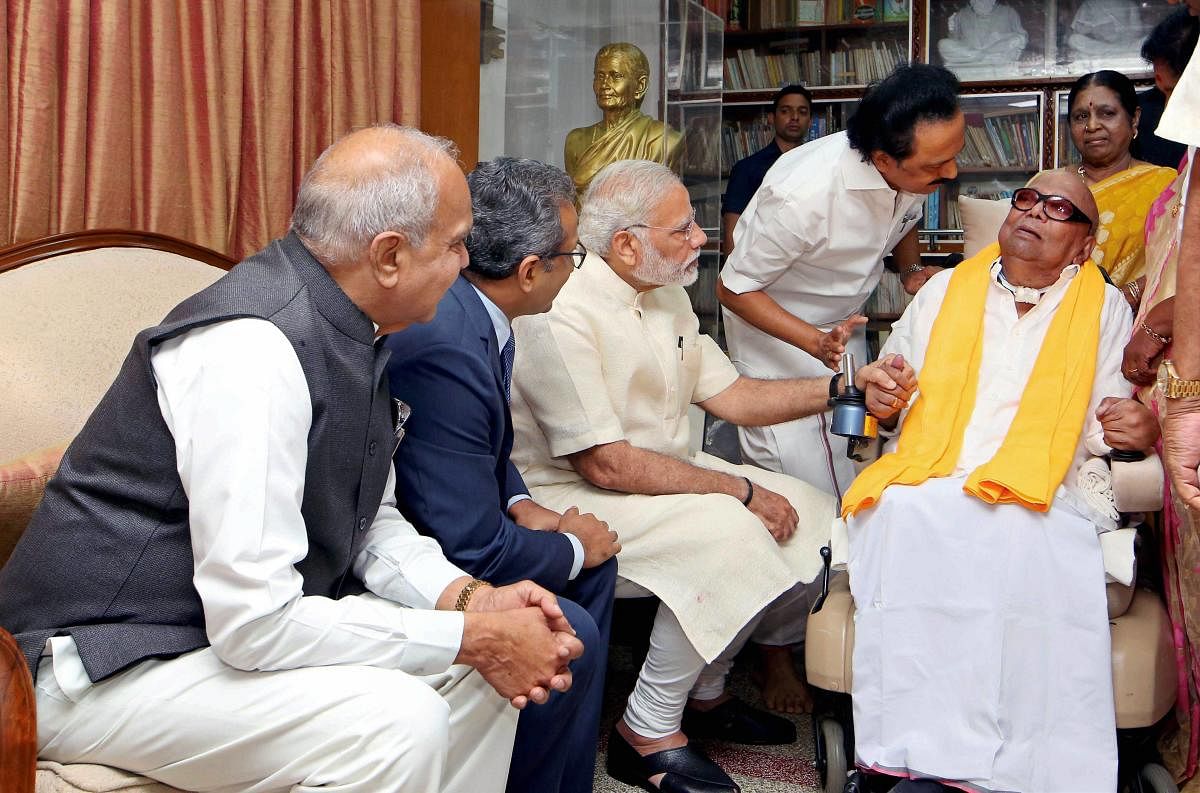 Chennai: Prime Minister Narendra Modi visiting the ailing DMK President M Karunanidhi in Chennai on Monday. DMK Working President M K Stalin, senior party leader Durai Murugan and other leaders are also present. PTI Photo (PTI11_6_2017_000067B)