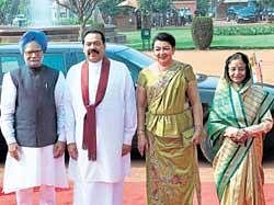 Welcome gesture: President Pratibha Patil and Prime Minister Manmohan Singh welcome Sri Lankan President Mahinda Rajapaksa and his wife Shiranthi during a ceremonial reception at Rastrapati Bhawan in New Delhi on Wednesday. PTI