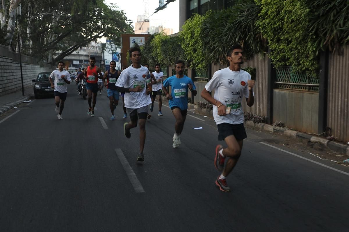 Citizens take part in Neerathon, a run to promote and advocate water conservation in the city, on Sunday. 