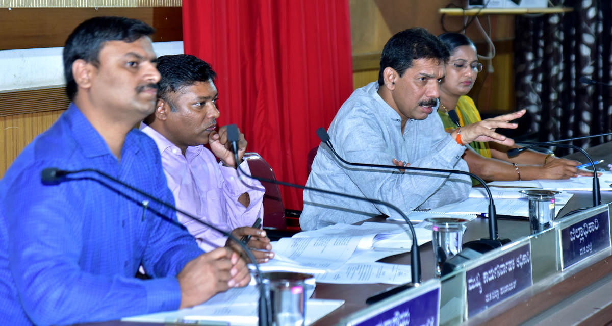 MP Nalin Kumar Kateel addresses a Development Coordination and Monitoring Committee (DISHA) meeting at the Nethravathi Hall of the Zilla Panchayat in Mangaluru on Monday.