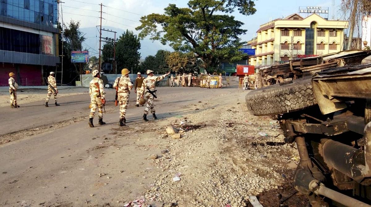 Security personnel patrol a street during restrictions, imposed after a mob went on a rampage during a protest against the move to grant permanent resident certificates to six communities living in the state, in Itanagar, on February 24, 2019. PTI