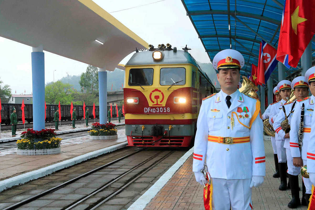 Vietnamese soldiers stand guard as a train transporting North Korea's leader Kim Jong Un arrives at the border town with China in Dong Dang, Vietnam on Tuesday. (Nhan Sang/VNA via REUTERS)