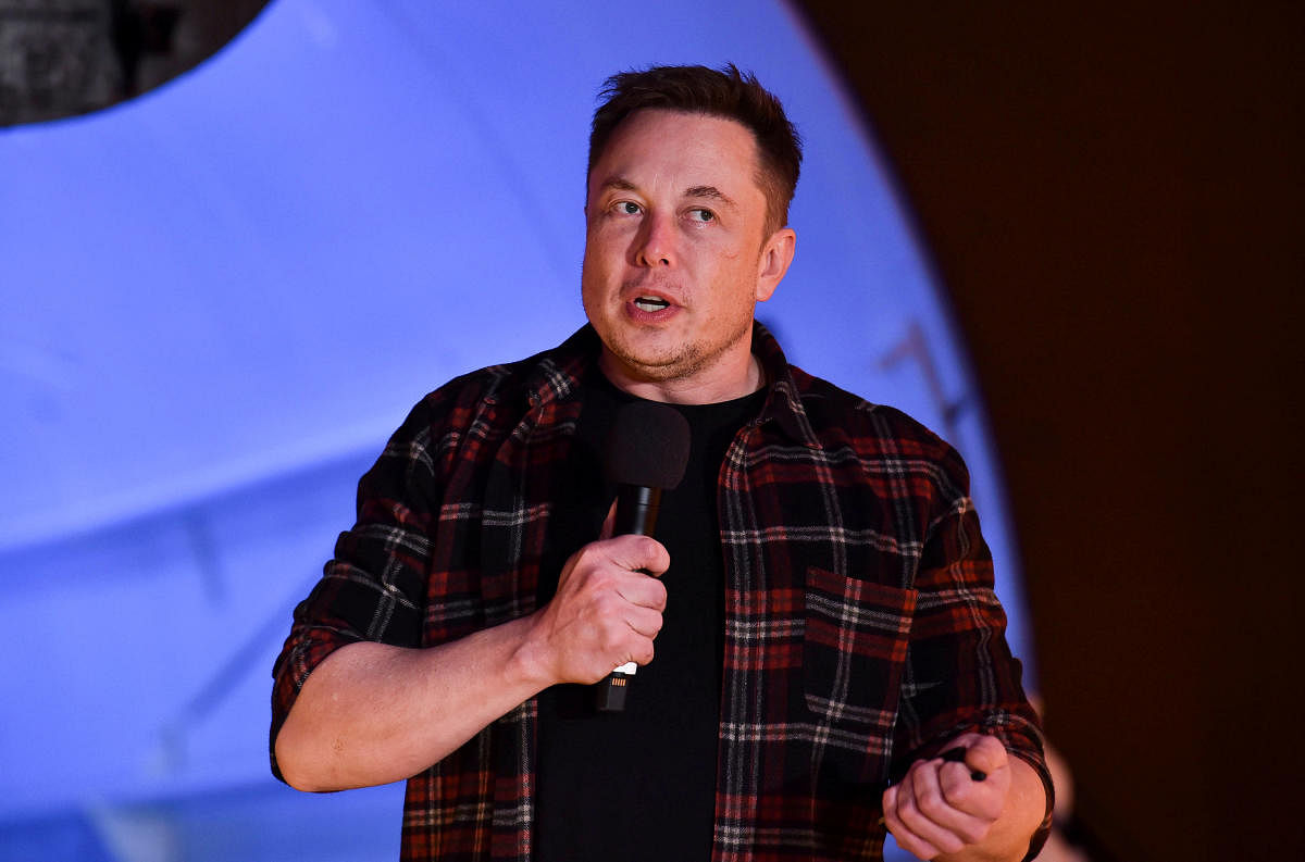 FILE PHOTO: Tesla Inc. founder Elon Musk speaks at the unveiling event by "The Boring Company" for the test tunnel of a proposed underground transportation network across Los Angeles County, in Hawthorne, California, U.S. December 18, 2018. Robyn Beck/Poo