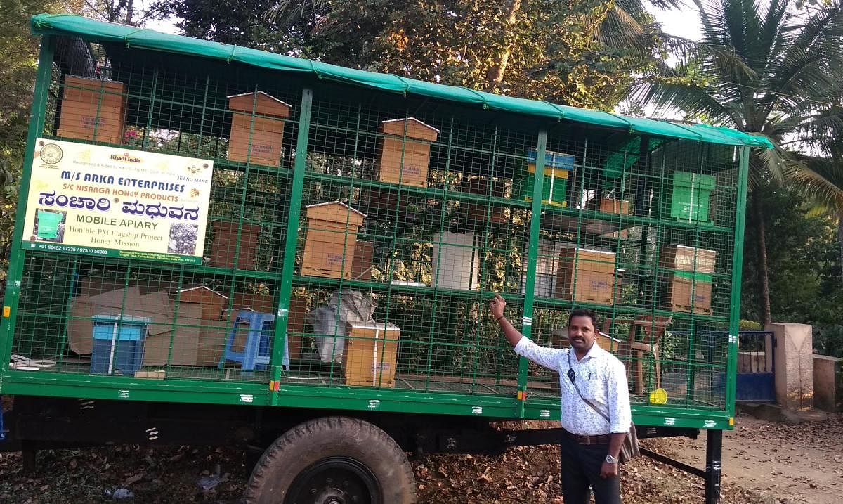 The 'Madhuvana' mobile apiary set up in a tractor trailer at the main road in Chennangolli near Gonikoppa.