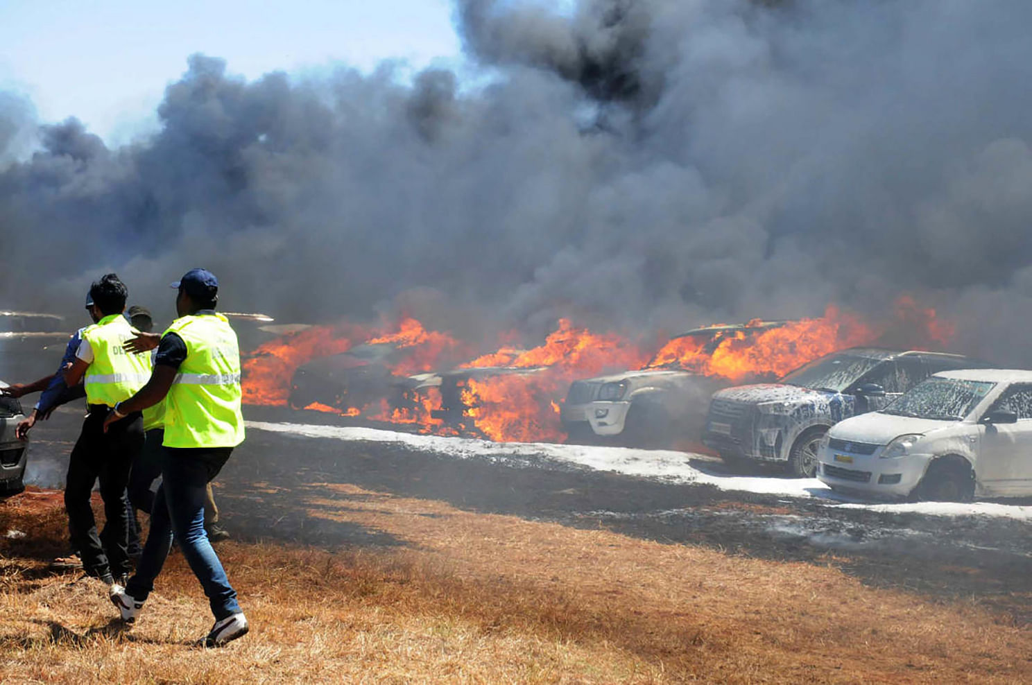 About 300 cars were gutted when a fire raged through dry grass at the Aero India parking area last Saturday.