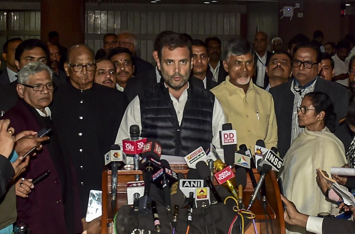 Congress President Rahul Gandhi reads a joint statement after the Opposition parties' meet at Parliament House complex, in New Delhi. (PTI Photo)