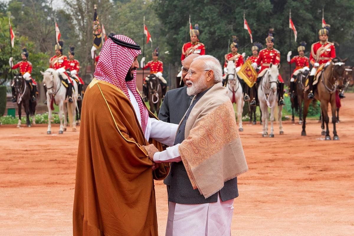 Prime Minister Narendra Modi (R) greeting Saudi Arabia's Crown Prince Mohammed bin Salman (L) during a ceremonial reception at presidential palace in New Delhi on February 20, 2019. AFP/SAUDI ROYAL PALACE/BANDAR AL-JALOUD
