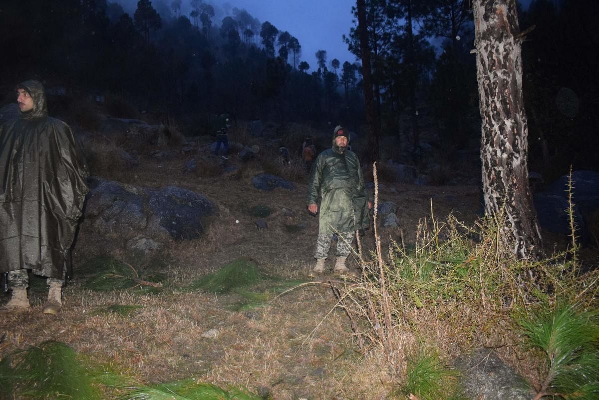 Pakistani soldiers and media personnel gather at the site where the Indian Air Force (IAF) strike launched on a Jaish-e-Mohammad (JeM) camp at Balakot. AFP file photo