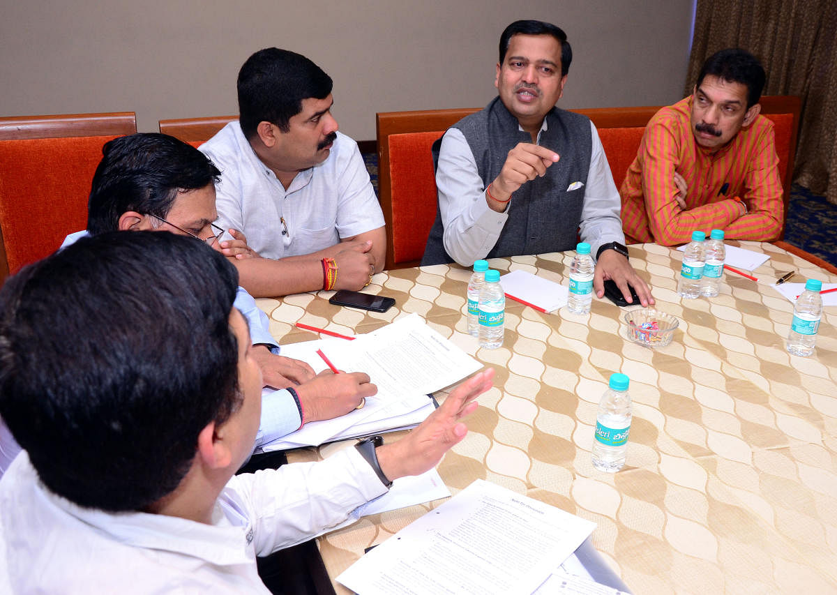 Vaibhav Dange, secretary to Union Minister for Road Transport, Highways and Shipping Nitin Gadkari, presides over a meeting with Navyug company and NHAI officials at Taj Gateway Hotel on Thursday, set a strict deadline for completion of flyovers in Thokko