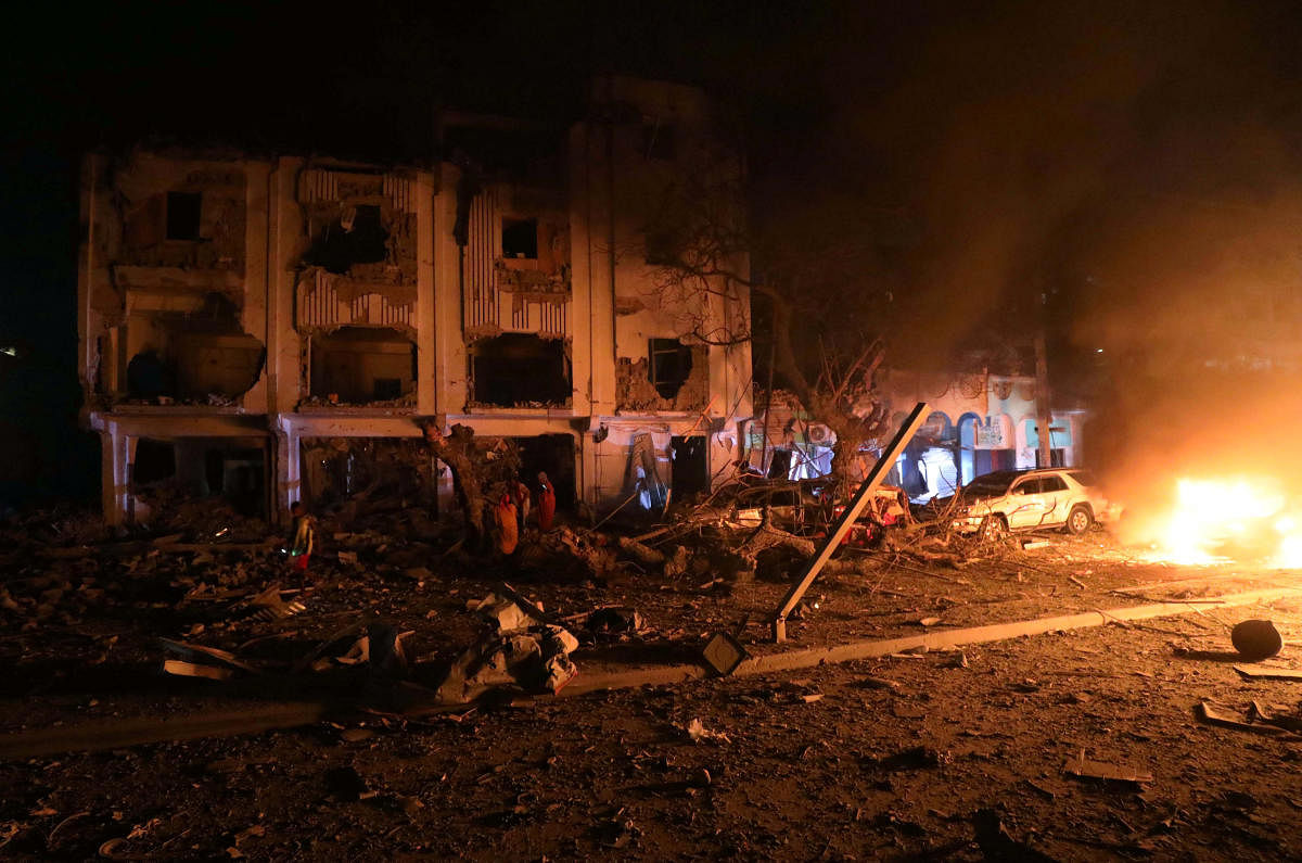 Flames are burning at the scene where a suicide car bomb exploded targeting a Mogadishu hotel in a business center in Maka Al Mukaram street in Mogadishu, Somalia. February 28, 2019. REUTERS/Feisal Omar TPX IMAGES OF THE DAY