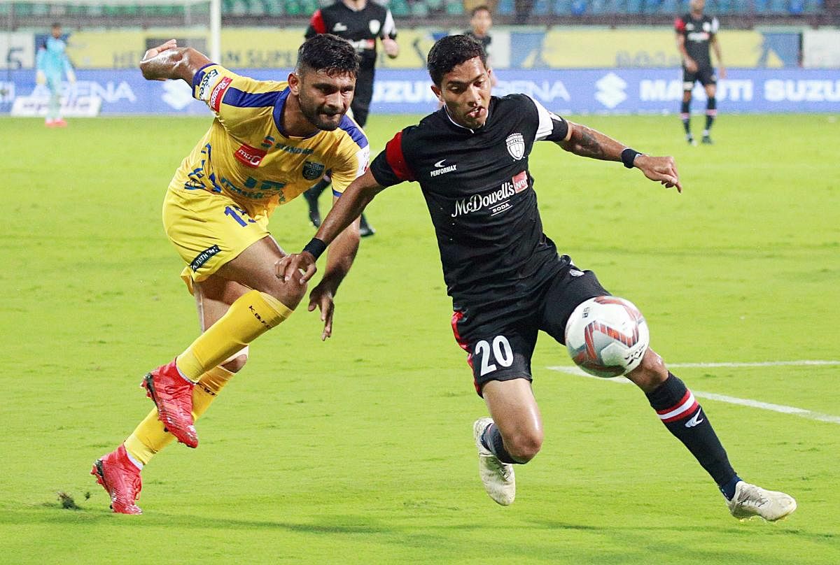 A slice of action from the Kerala Blasters FC and North East United FC ISL game in Kochi on Friday. PTI