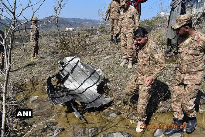 File picture of cross section of F16 engine and wreckage of downed Pakistani F16 jet. ANI