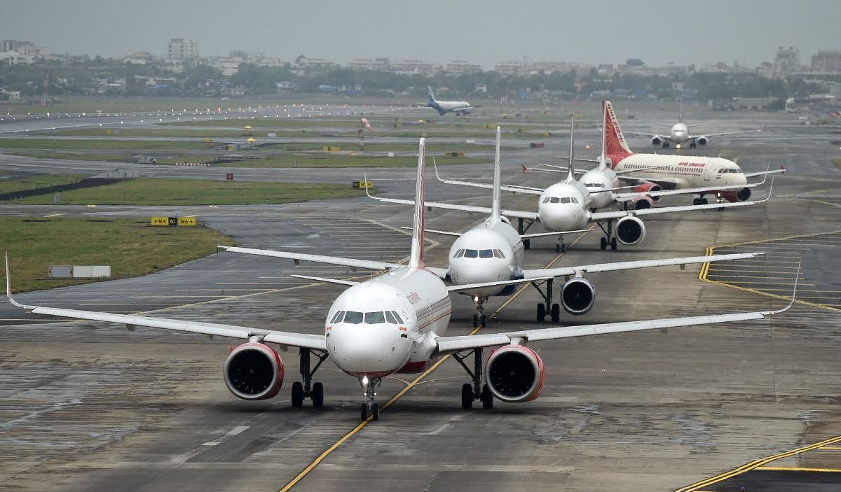 Aircraft queue up on the tarmac before take off at the Mumbai airport. (AFP File Photo)