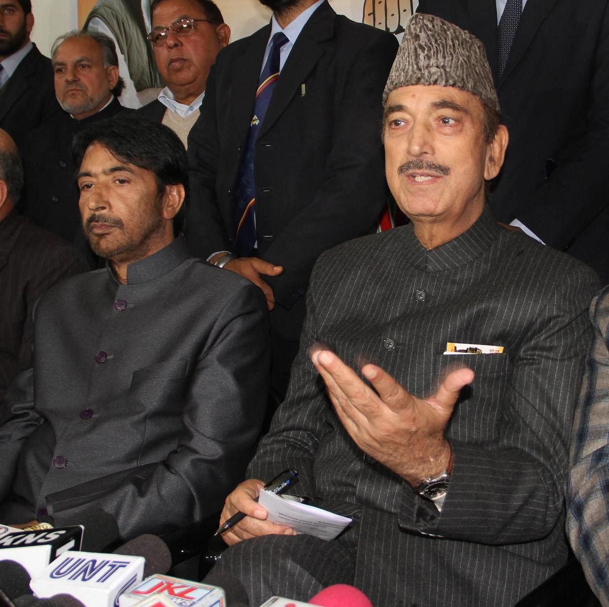 Senior Congress leader Ghulam Nabi Azad and JKPCC President GA Mir at a press conference, in Jammu on Saturday. (PTI Photo)