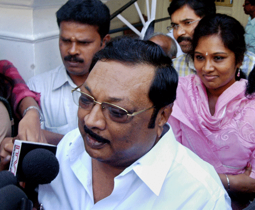 DMK Chief M Karunanidhi's son and former Union Minister MK Alagiri along with his daughter Kayalvizhi addressing the media after meeting his father at his Gopalapuram residence in Chennai on Saturday. PTI Photo