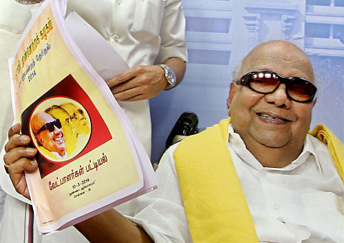 DMK Chief M Karunanidhi releases the party's candidate list for upcoming parliamentary elections at the DMK party office in Chennai on Monday. PTI Photo