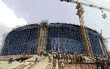 Work on the massive new Tamil Nadu assembly complex in progress at the Omandur P Ramaswamy Reddy Government Estateoff Arterial Mount Road in Chennai on Monday.