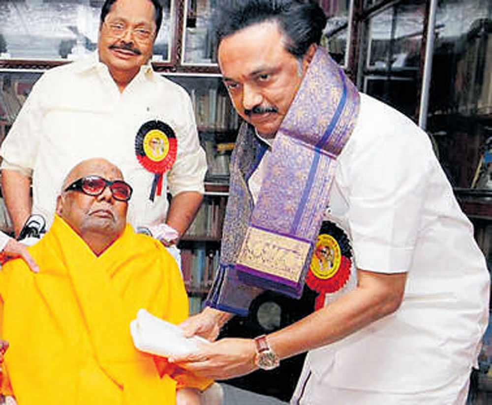 M K Stalin meets Karunanidhi after the party's general council meeting. For the first time in 48 years, Karunanidhi could not participate in the meeting. PTI