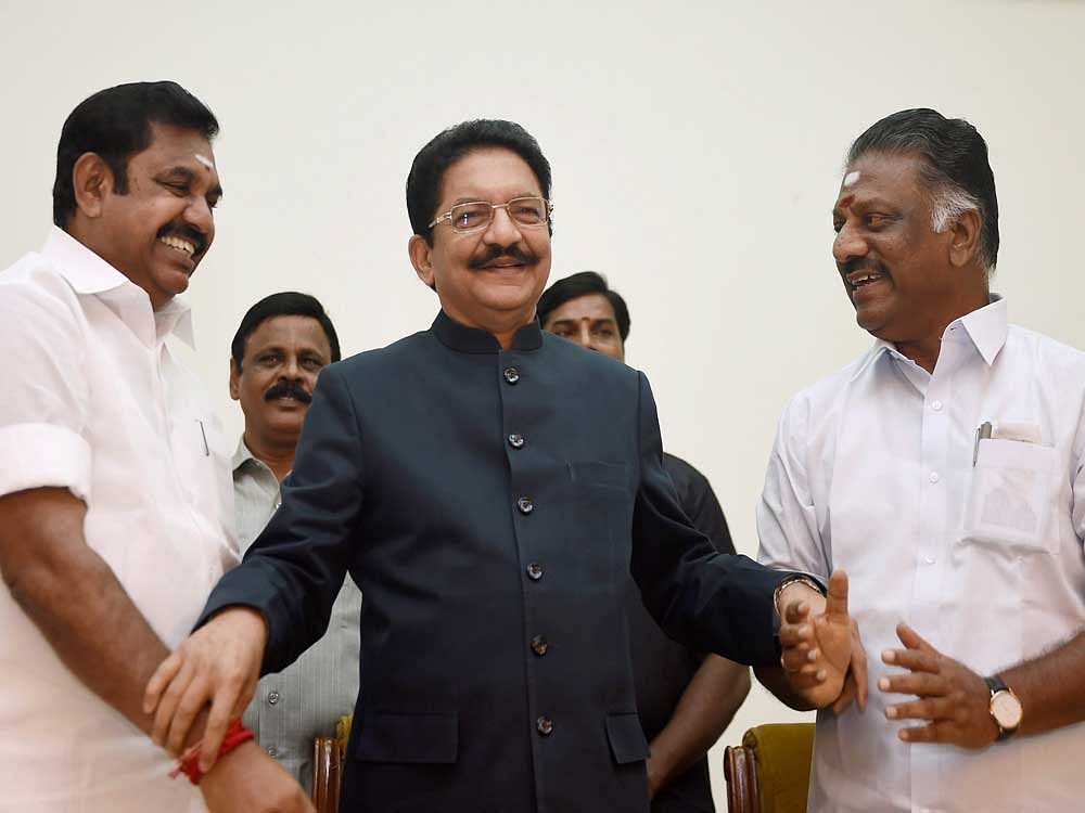Tamil Nadu CM K Palaniswami (left) with O Panneerselvam (right) after he was sworn in as Deputy Chief Minister by Governor Ch Vidyasagar Rao in Chennai on Monday. PTI